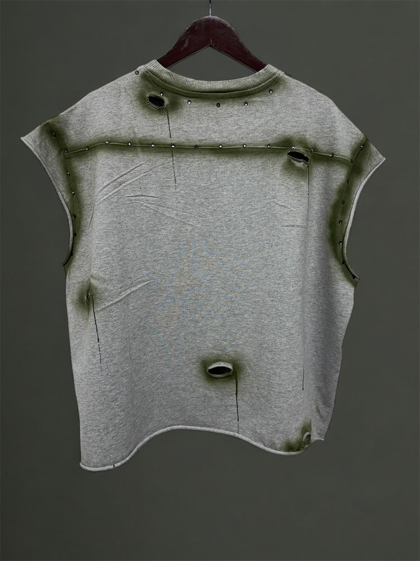 gray sleeveless with a ripped and rhinestone design