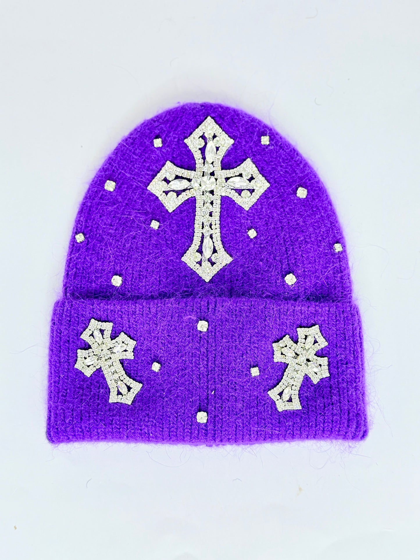 Purple winter hats with rhinestone crosses