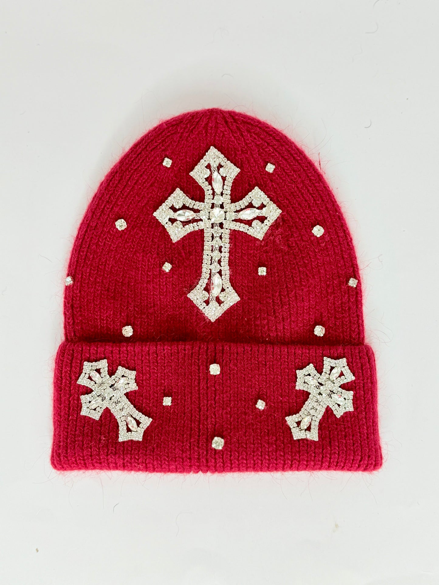 Red winter hats with rhinestone crosses