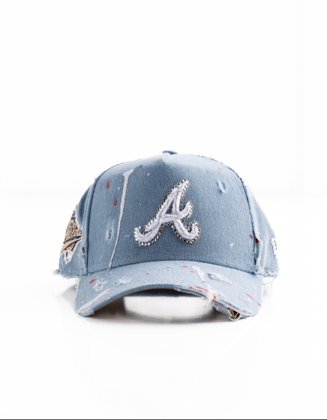 LA Dodgers blue denim cap with painted rips and rhinestone designs