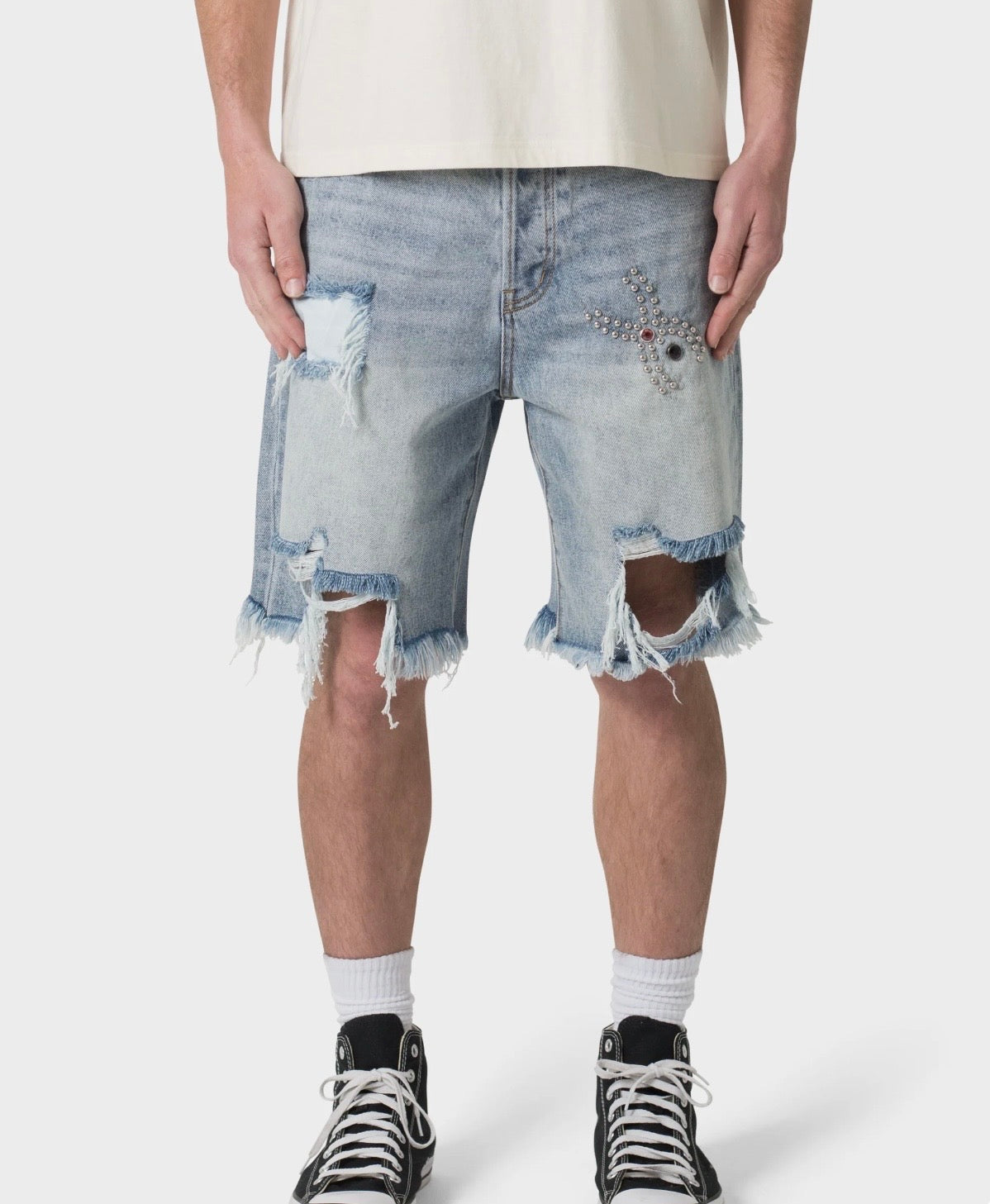 Shorts vaqueros desgastados con estampado de araña - Azul claro