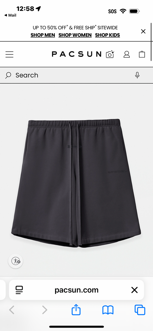 Fear of God ESSENTIALS Vintage Black Active Trace Relaxed Sweat
Shorts