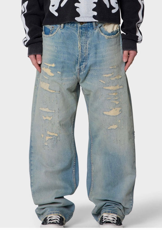 Jeans de mezclilla con ripios